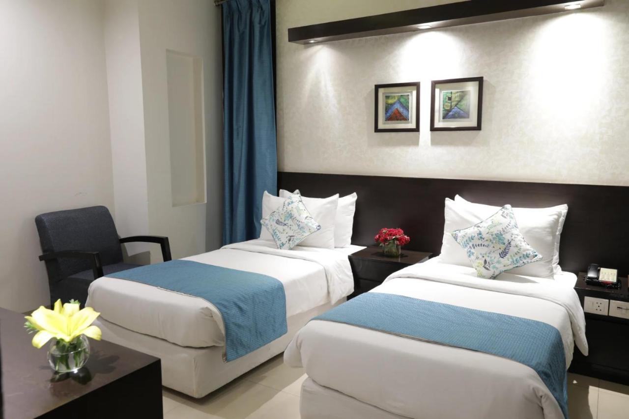 Hotel Rockland Panchsheel Enclave Нью-Дели Экстерьер фото