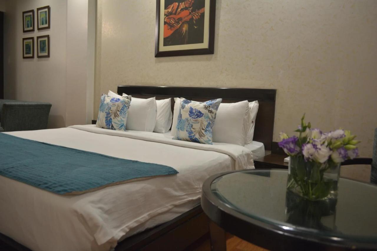 Hotel Rockland Panchsheel Enclave Нью-Дели Экстерьер фото